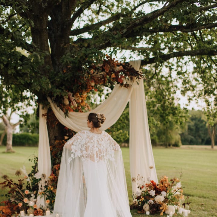 Amazing bridal cape at Reymerston Hall