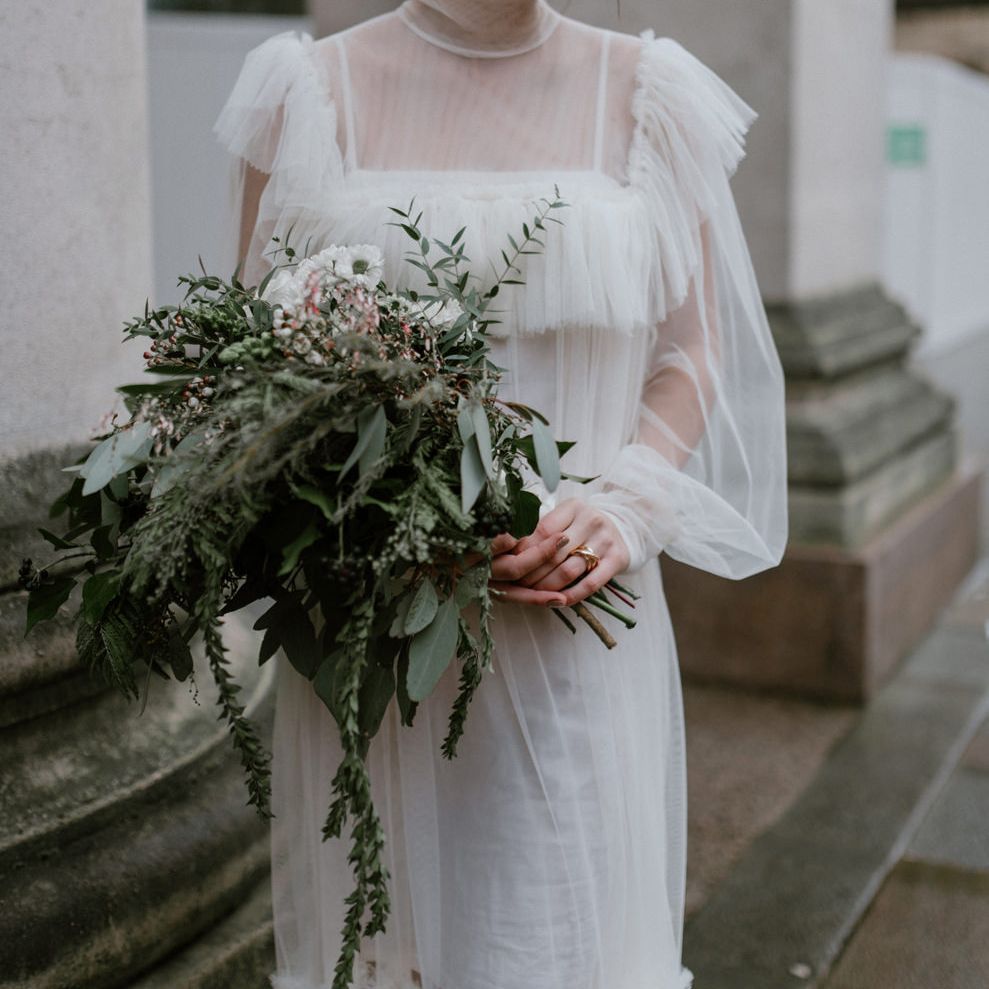 Amelie Tulle wedding dress with ruffled bid detail and long sleeves