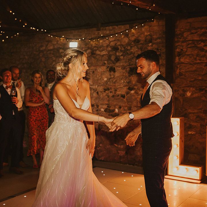 Bride and groom first dance at East Afton Farmhouse wedding