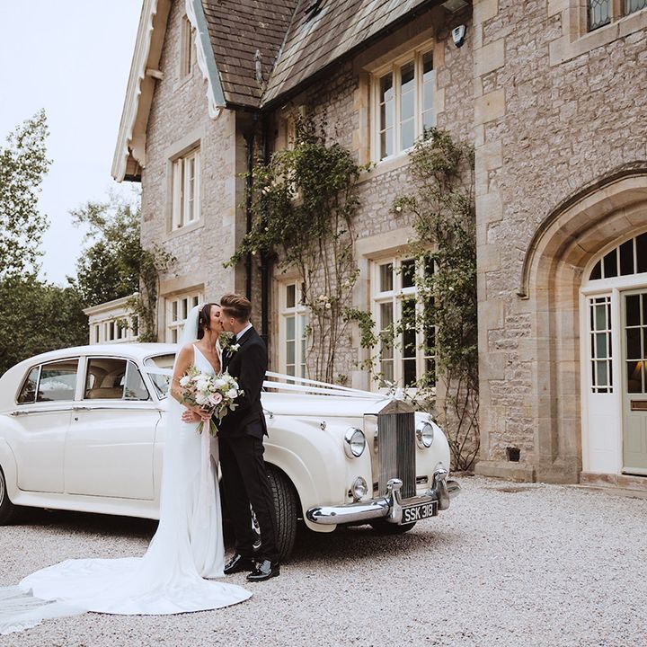 Vintage Rolls Royce wedding car for the bride and groom's classic luxe country house wedding venue 