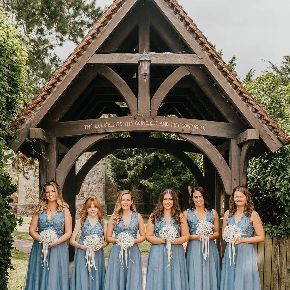 Bridesmaid dresses in blue gowns for East Quay wedding
