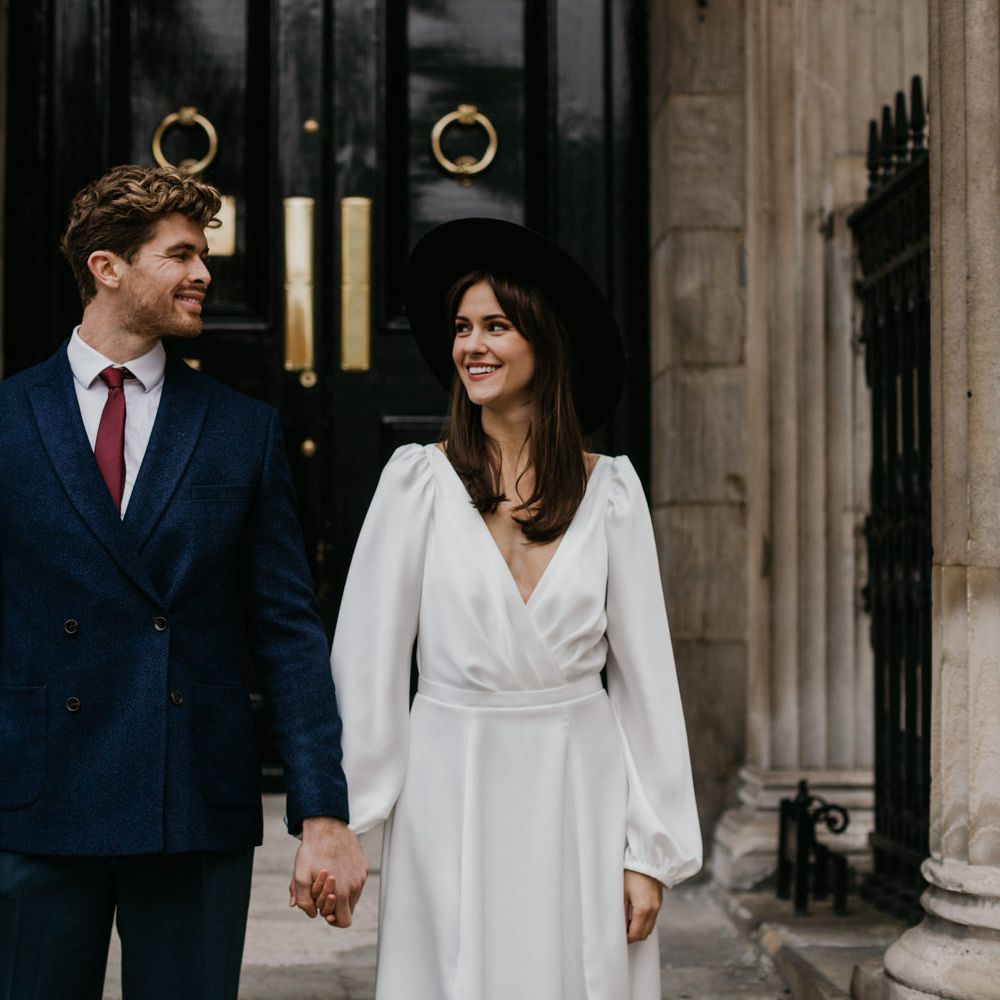 Stylish Bride and groom at intimate wedding 