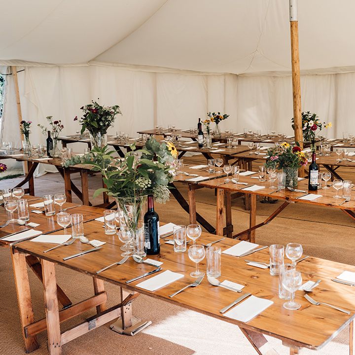 Rustic interior of tipi for wedding reception