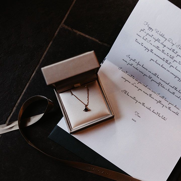 Personal handwritten note from the groom to the bride with a gift including a Bvlgari necklace
