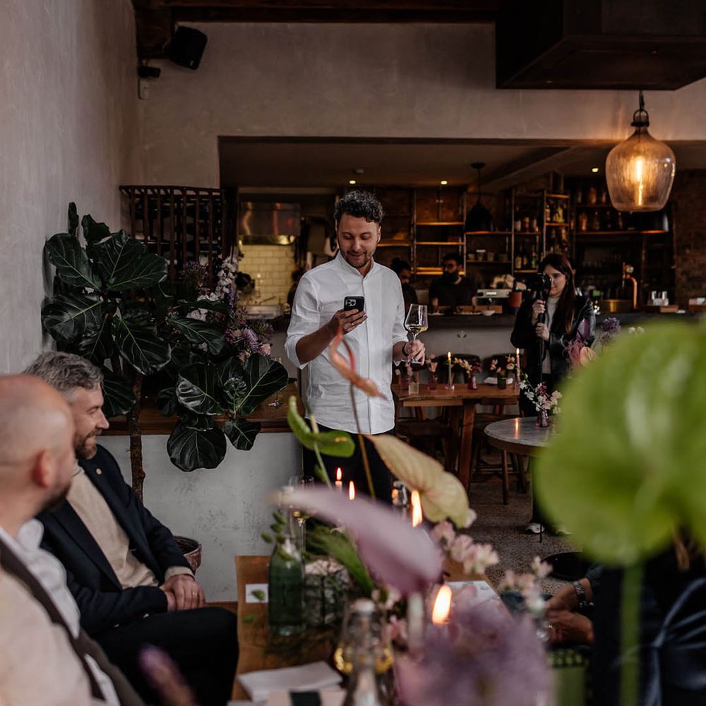 Wedding guest delivering a speech at Perilla wedding reception 