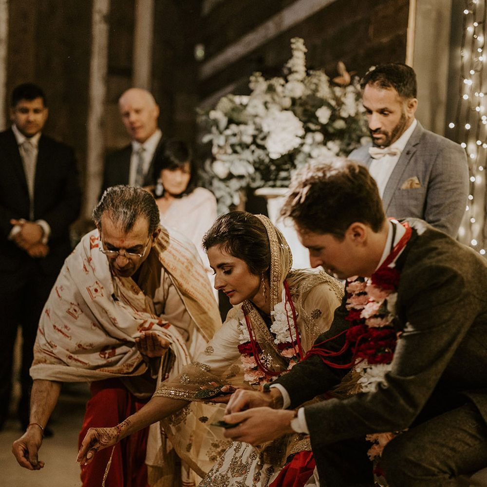 Interfaith Hindu blessing wedding ceremony uniting the bride and groom 