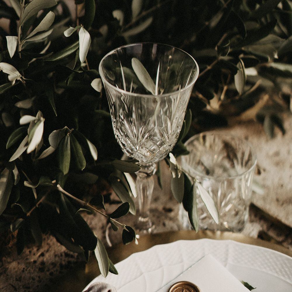 Crystal cut wine glass with olive branches