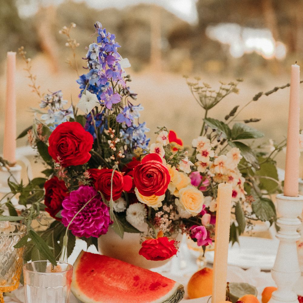 Bright floral bouquet with roses and green foliage