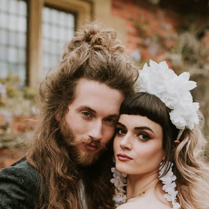 bride in a 3D flower headband with matching earrings 