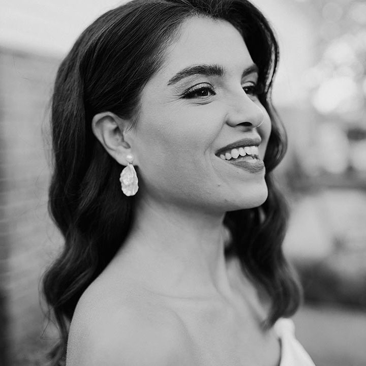 Bride with pearl earrings with brunette hair in Hollywood waves