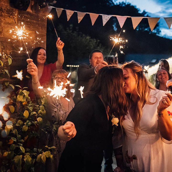 Lesbian wedding with two brides having sparkler send off at the end of the evening at The Parlour, Blagdon