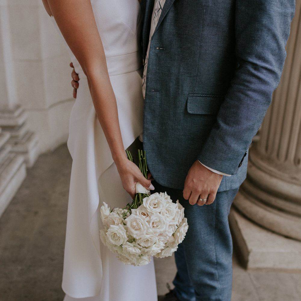 All white rose wedding bouquet for intimate wedding 