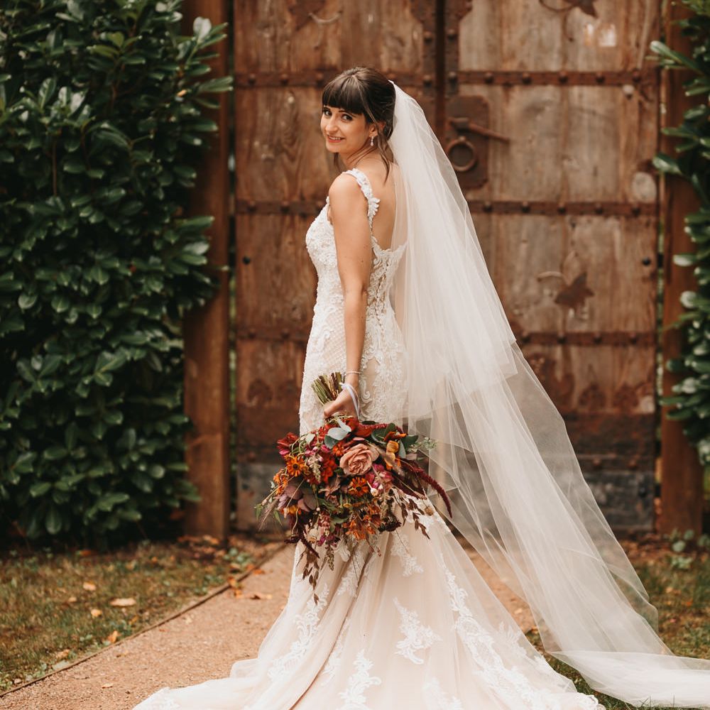 Bride in Abbie Maggie Sottero wedding dress