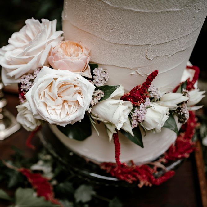 locally sourced wedding flowers to decorate the wedding cake 