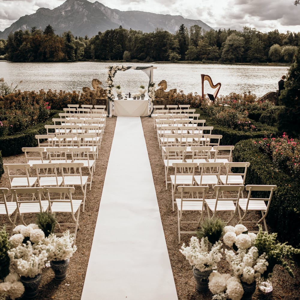 Outdoor wedding ceremony at by the lake in Salzburg, Austria