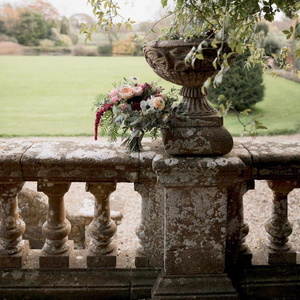 Berry wedding bouquet at Brympton House wedding venue