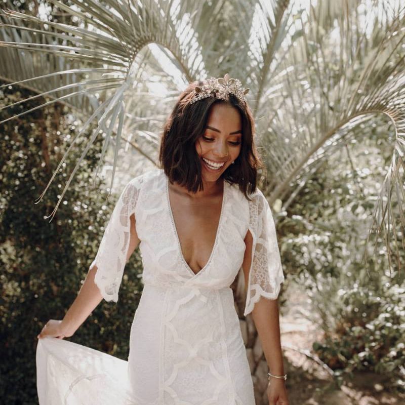 Boho bride in a lace wedding dress and Tlily Thomas Lux bridal crown 