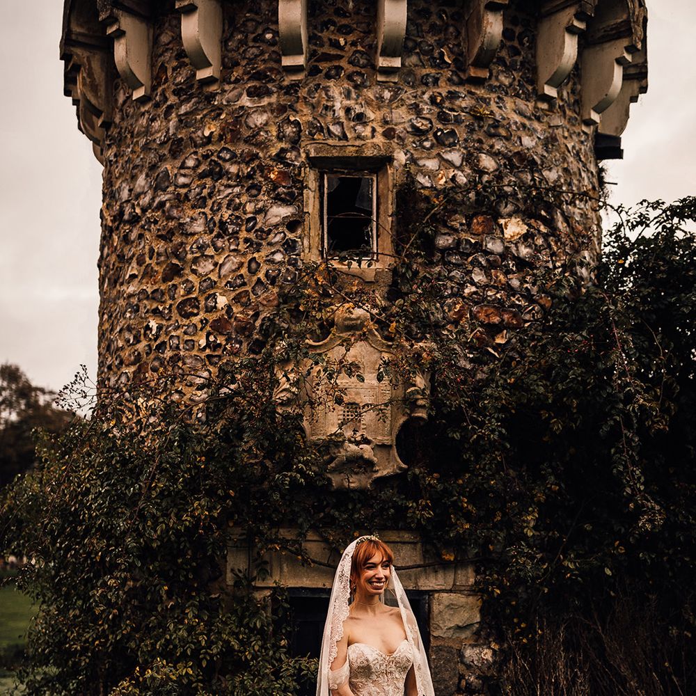 Martina Liana wedding dress with lace trim veil