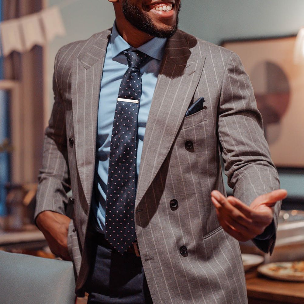 Wedding guest smiles and laughs on wedding day