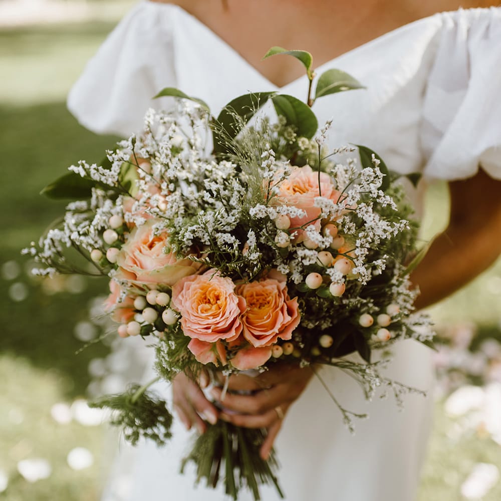  Bride holding pink and white bouquet 