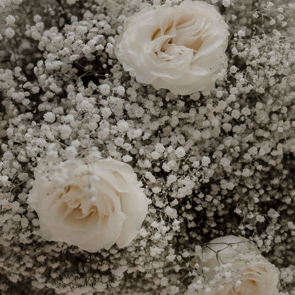Gypsophila and white rose wedding flower arrangements 