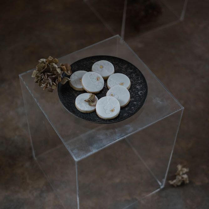 biscuits on a black plate 