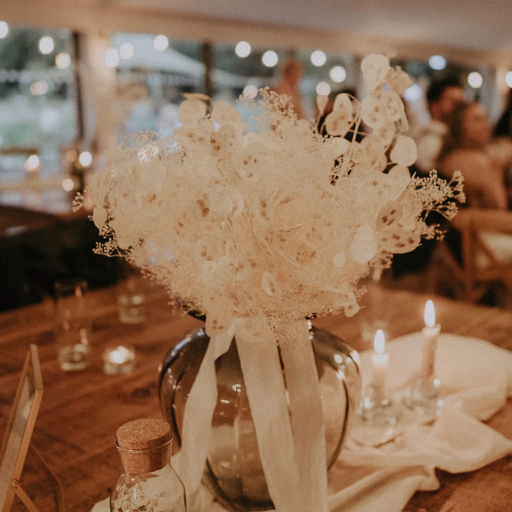 Dried white flower wedding table centrepieces