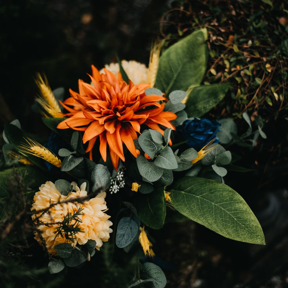 Orange, yellow and green tropical wedding bouquet for rustic farm wedding