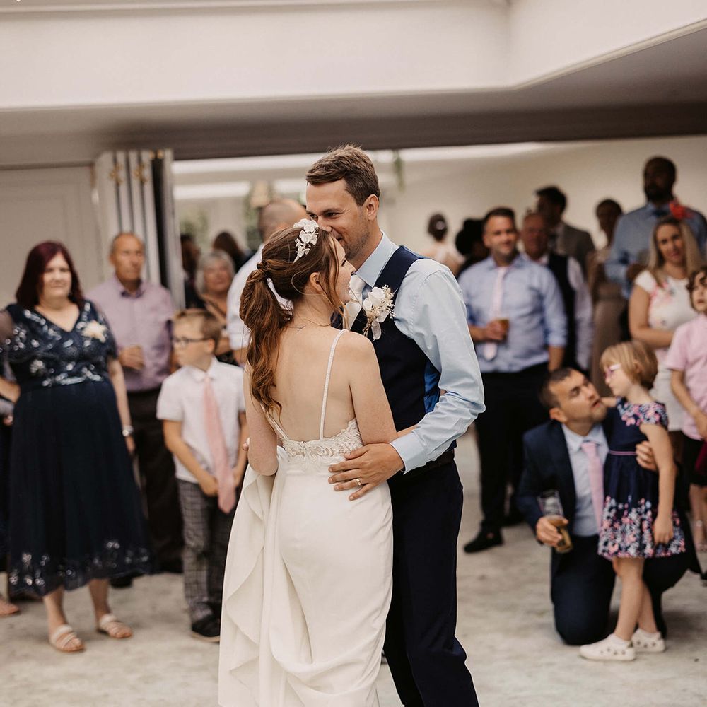 Bride & groom dance during their wedding reception 