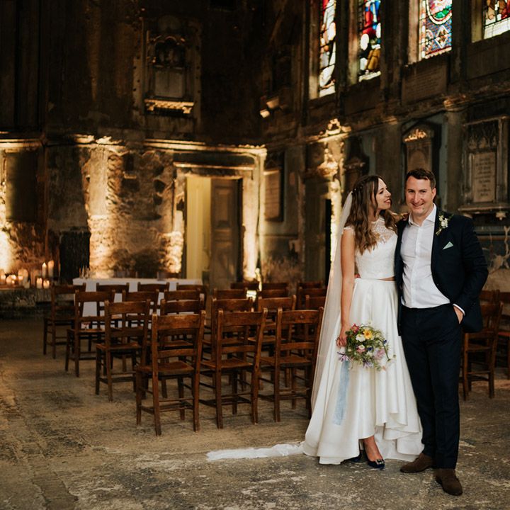 Bride and groom at industrial styled Asylum Chapel wedding venue 