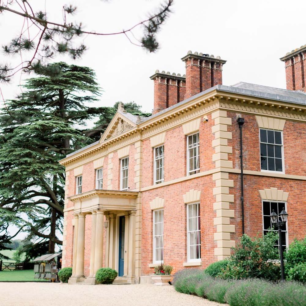 The outside and grounds of Garthmyl Hall, one of the UK's best country house wedding venues