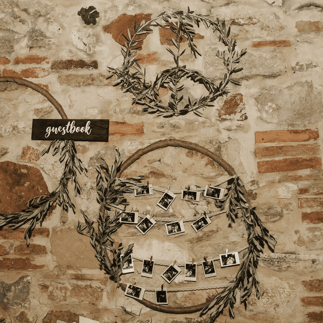 olive bouquet branch wall guestbook photobooth