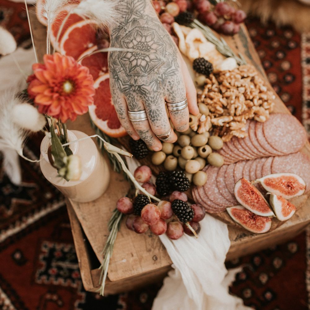 Grazing plate on top of wooden board for outdoor picnic