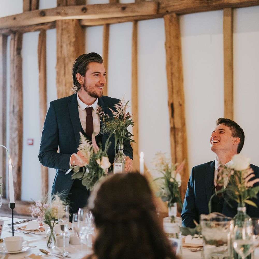 Wedding guest makes a speech during reception 