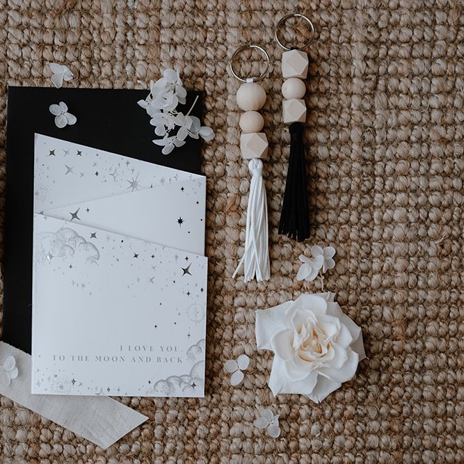 Black white and grey moon and stars wedding stationery design 