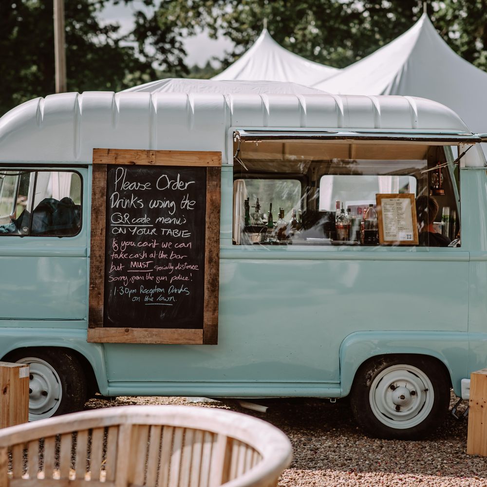 Drinks van with rustic and vintage vibe in baby blue colour and with chalk board to the front
