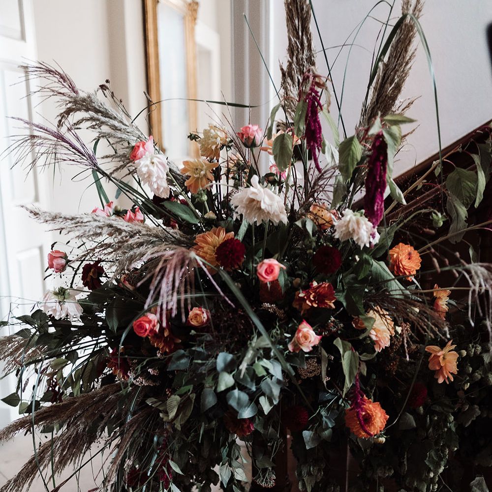 Mixed dried luxe floral display for autumn wedding at Iscoyd Park