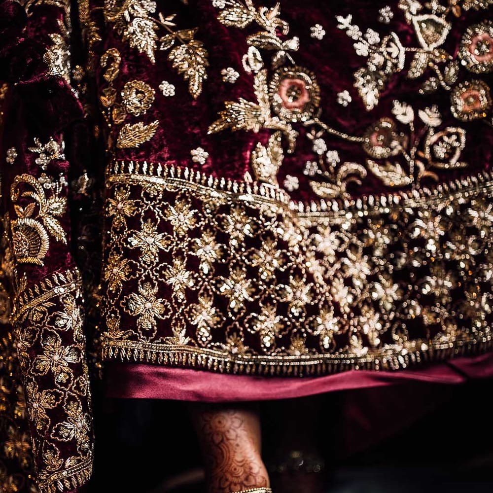 Embroidered gold detailed burgundy wedding dress 