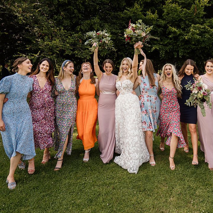 Bride walks with the bridal party 