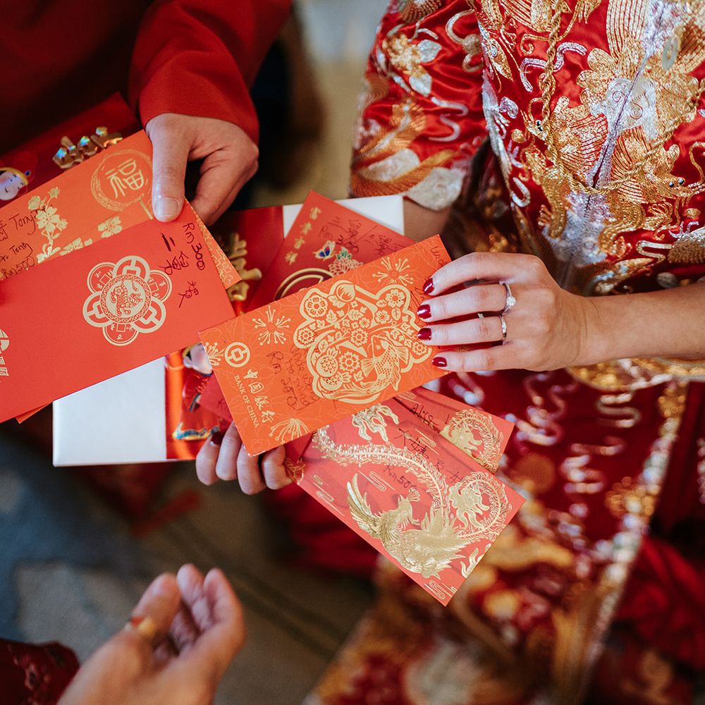 Bride & groom during traditional Chinese Tea Ceremony at The Dorchester 