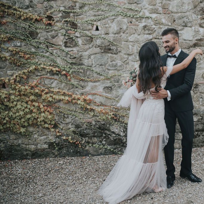 Bride and groom first look at Tuscany elopement 