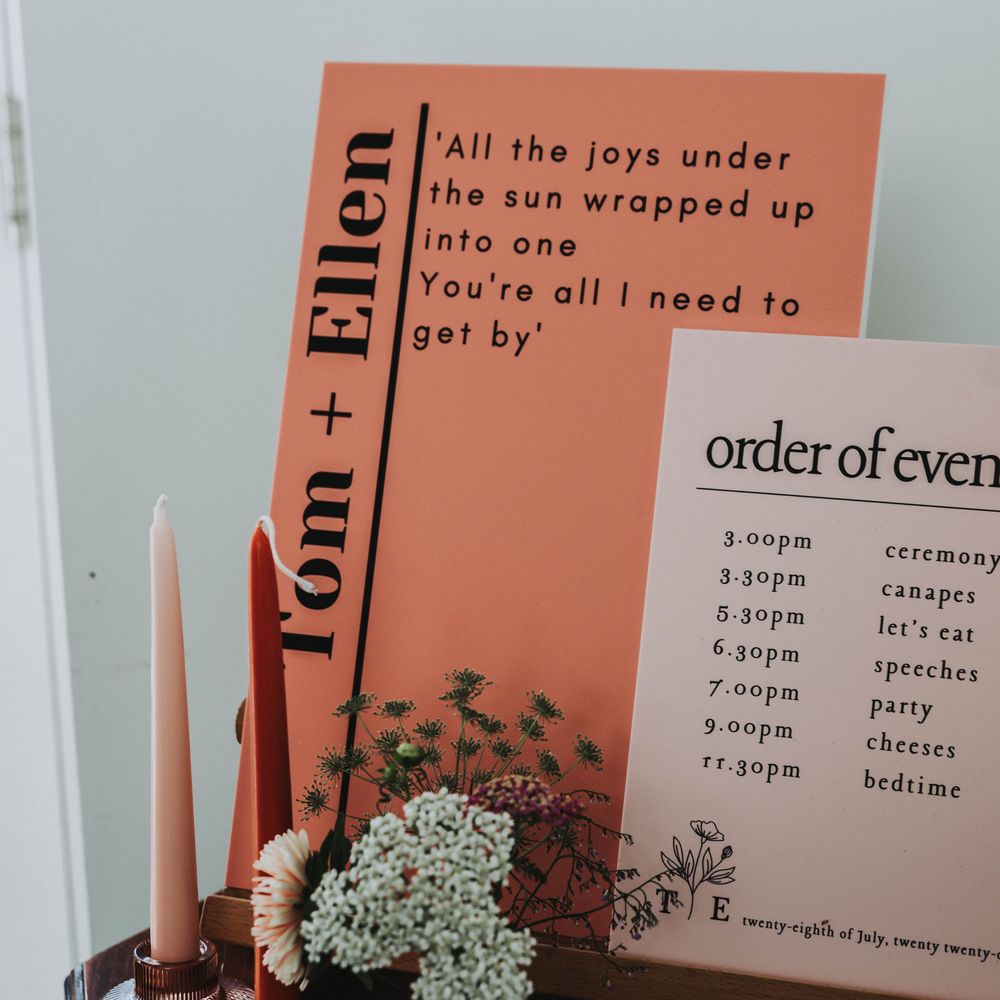 Pink and peach stationery complete with black writing 