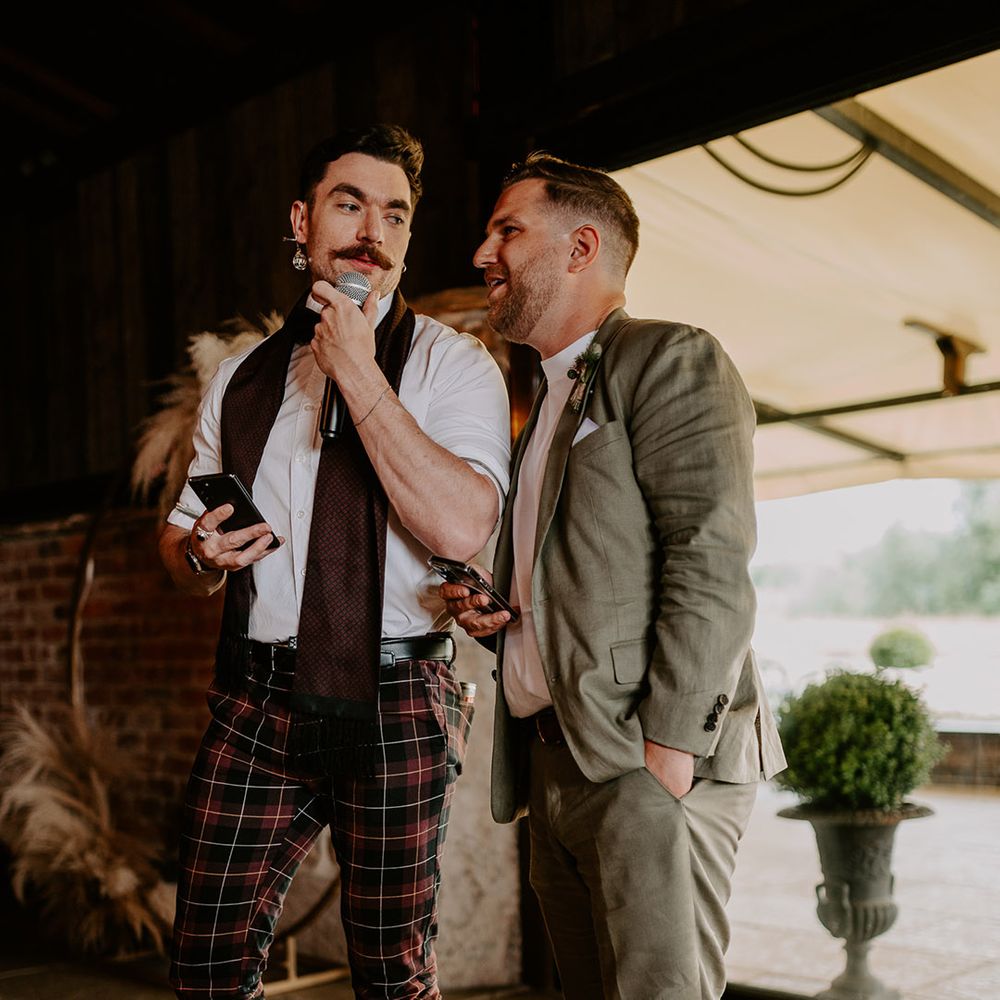 Joint wedding speech performance between the groomsman at Loughborough wedding 