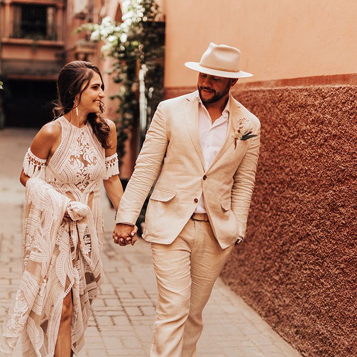 A Marrakech intimate destination wedding with the bride and groom wearing boho chic wedding outfits 