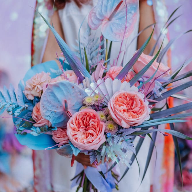 pastel wedding bouquet with spray painted anthuriums and grasses 