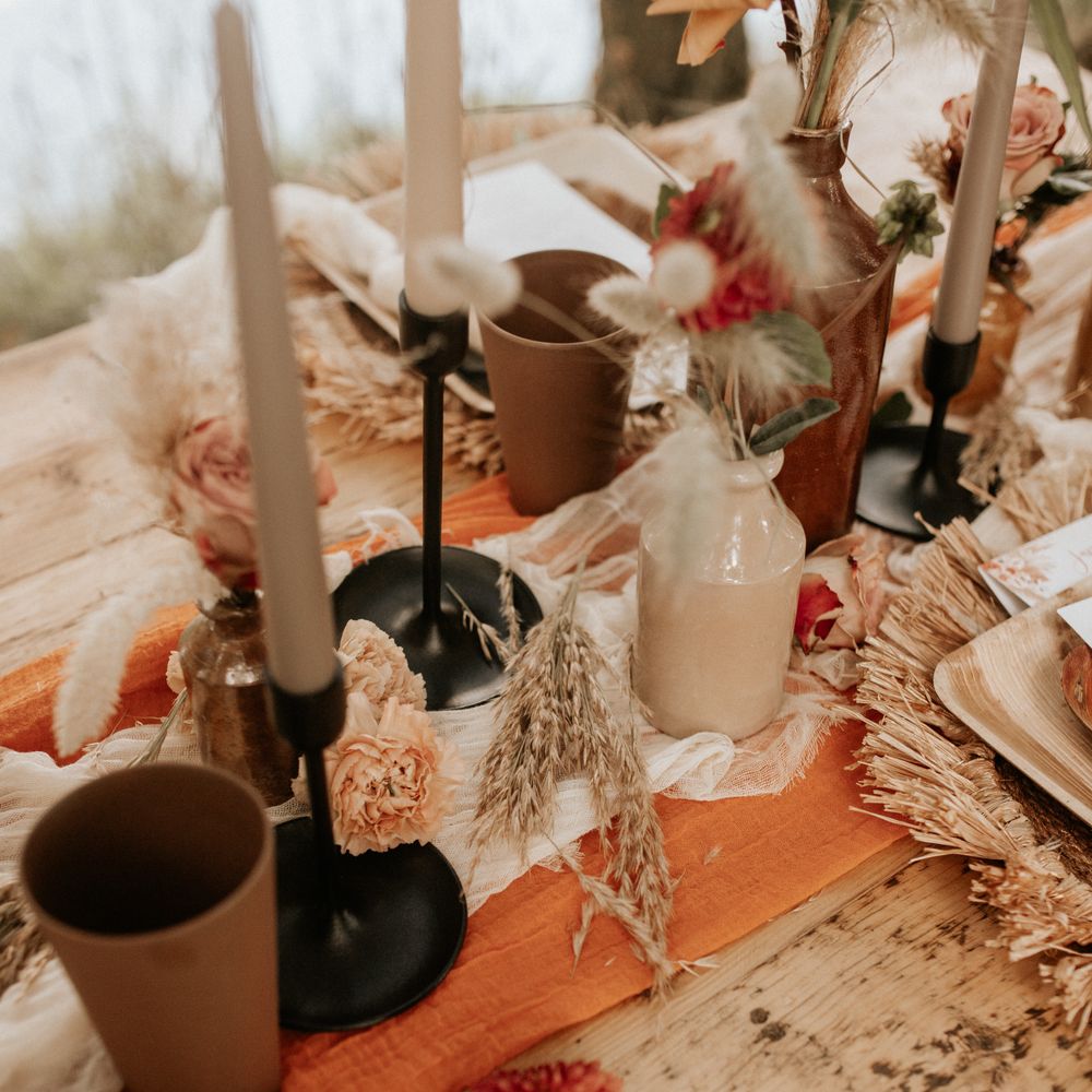 Table decor with black candlestick holders 
