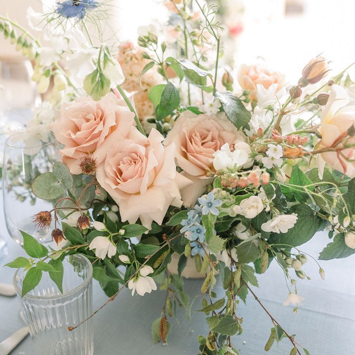 Pastel peach rose floral centrepiece wedding table decor