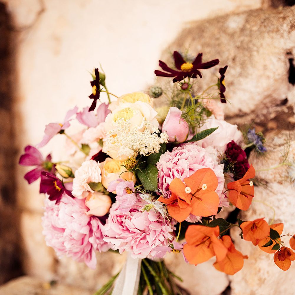 Pink, orange, white and red wedding bouquet 