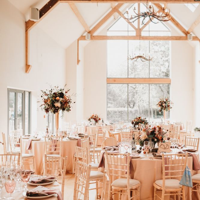 Millbridge Court wedding reception with autumn flowers and rustic decor 