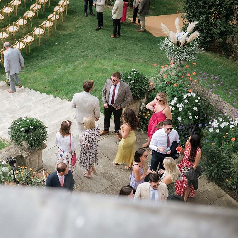 Outdoor summer garden wedding at Georgian home in Bath with colourful flowers 